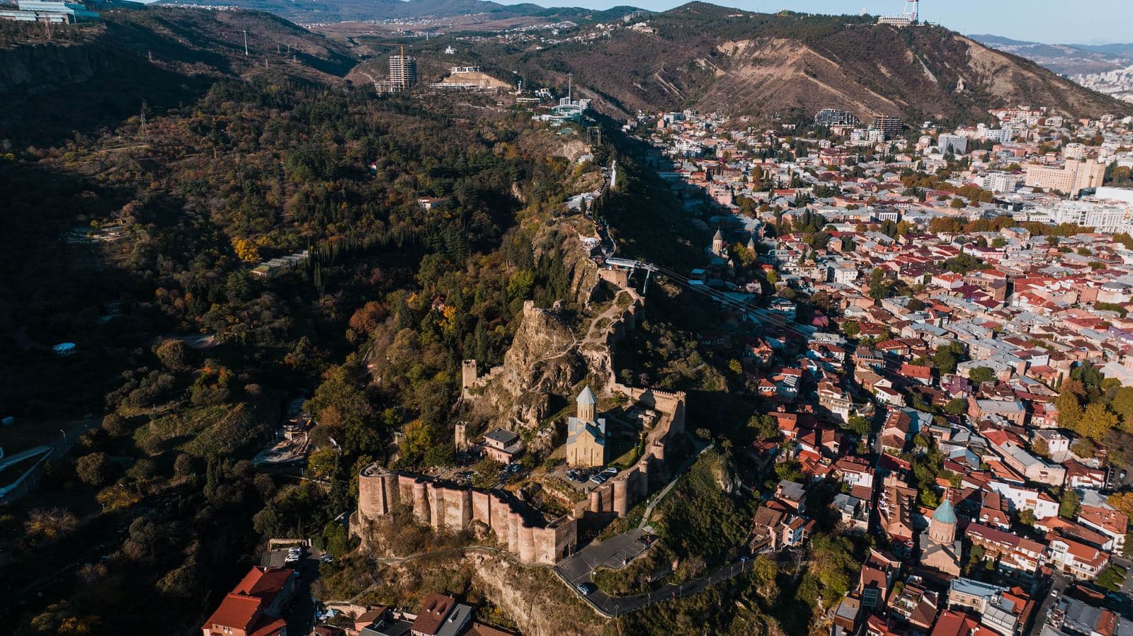 Aerial view of Narikala Fortress overlooking the rooftops of Tbilisi's old town, Georgia
