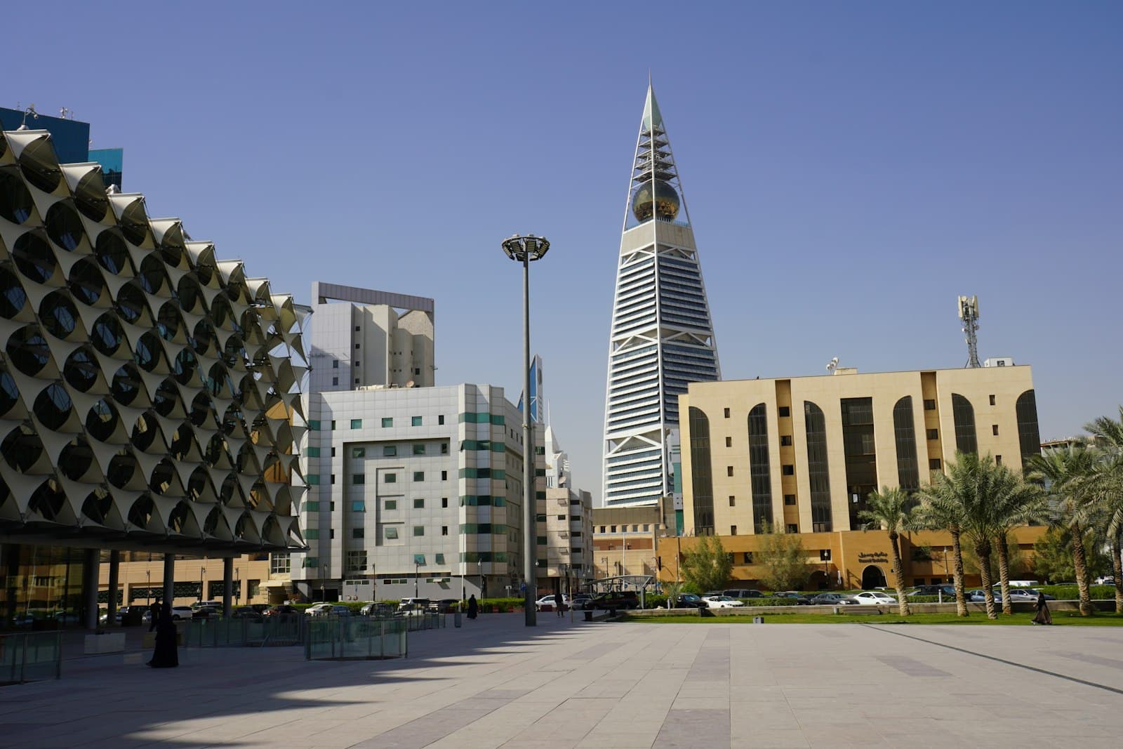 Al Faisaliah Tower and the Riyadh skyline, Saudi Arabia, the pyramid-shaped skyscraper with its golden globe apex