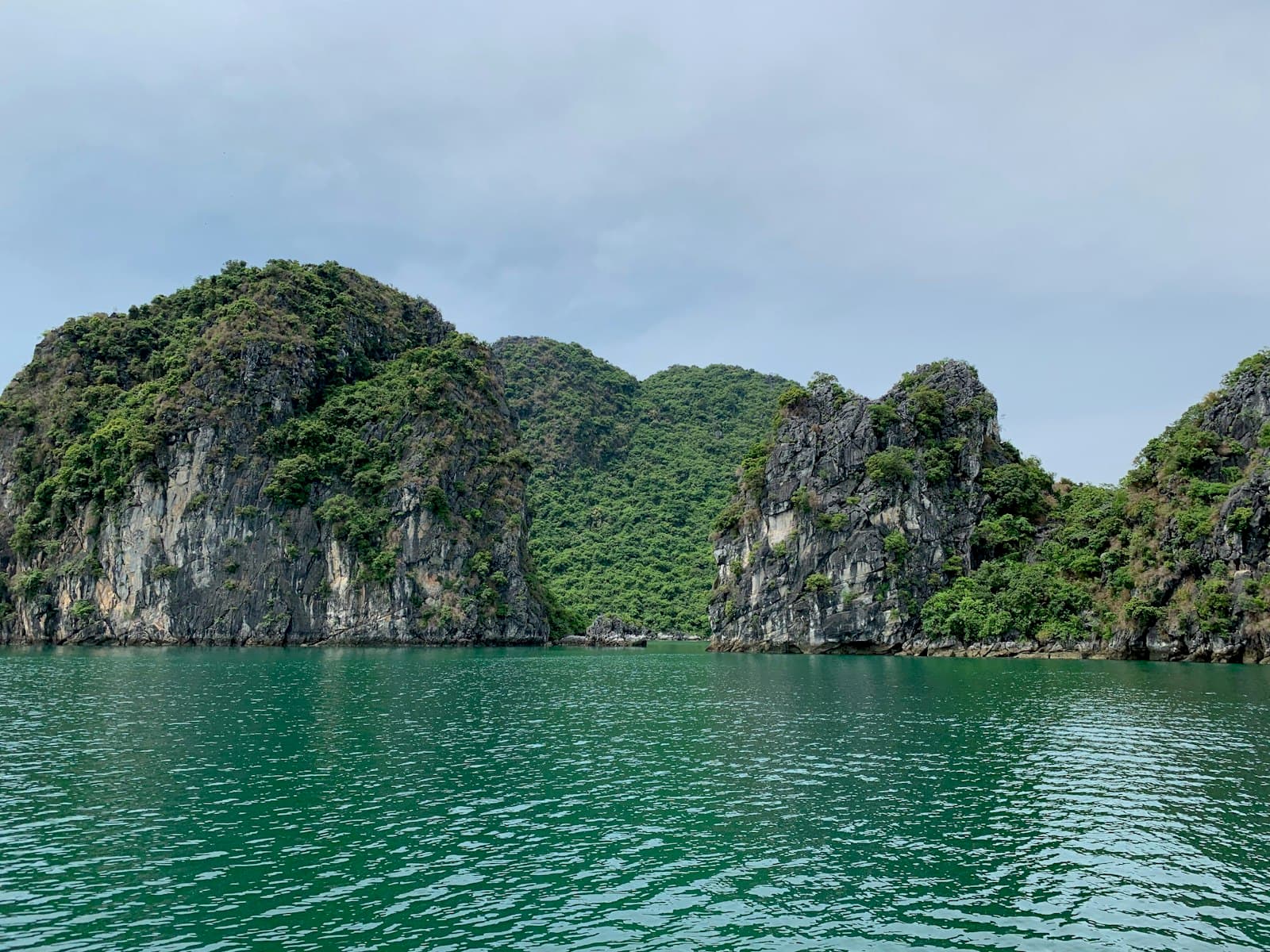 Ha Long Bay, Vietnam — limestone karst islands rising from turquoise water
